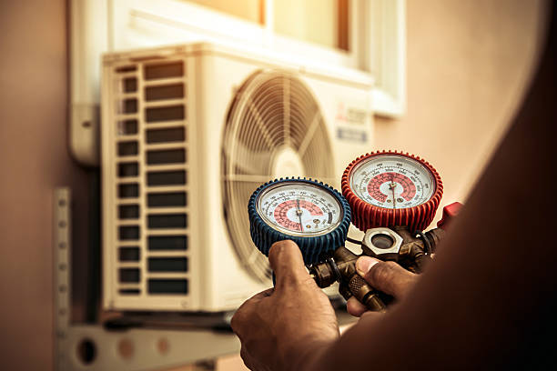Professional Ductwork Repair technician working in Lake Park, FL